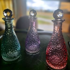 Set of 3 glass bottles